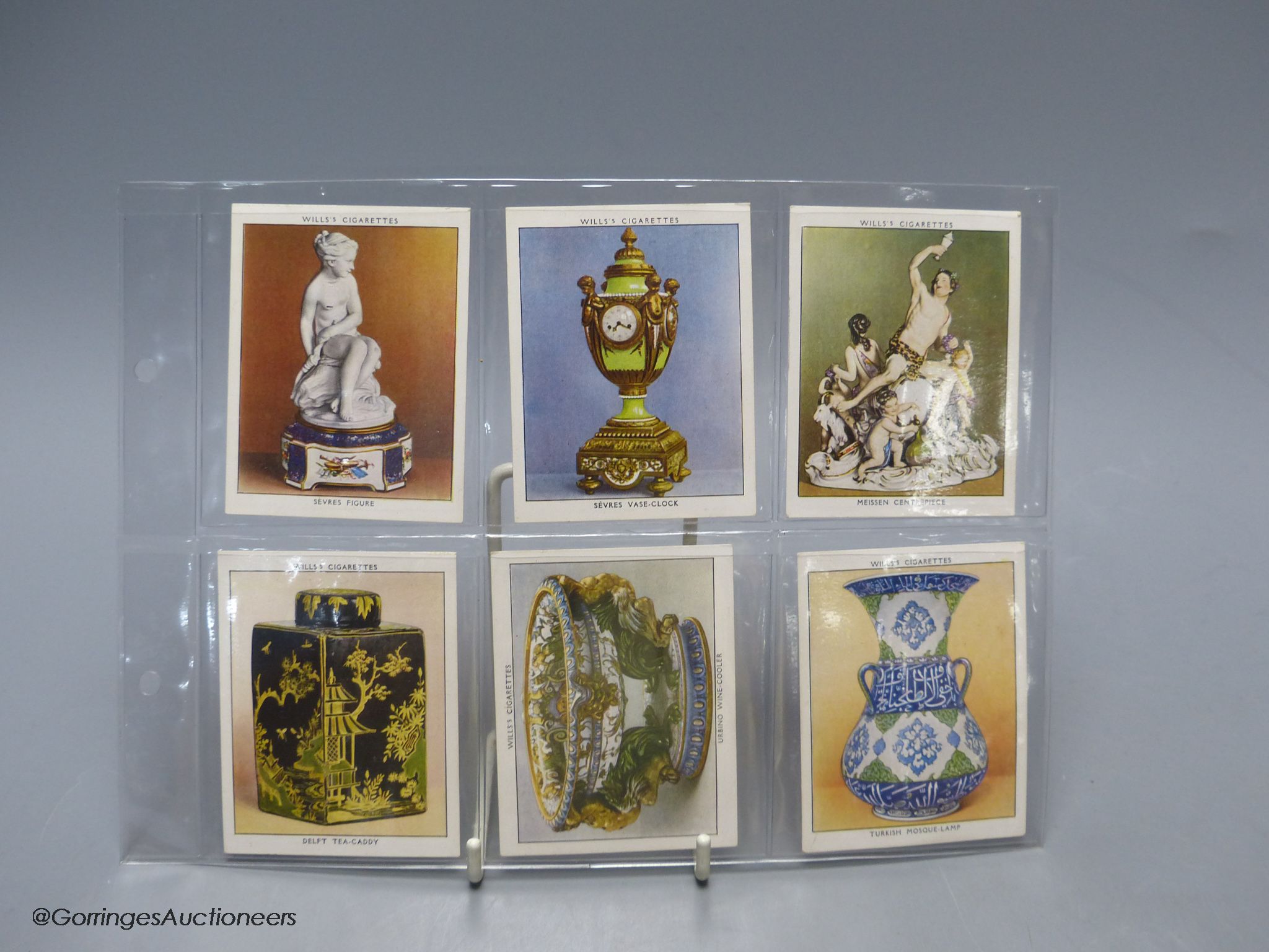 Smoking items including a Japanese camera lighter and cigarette cards